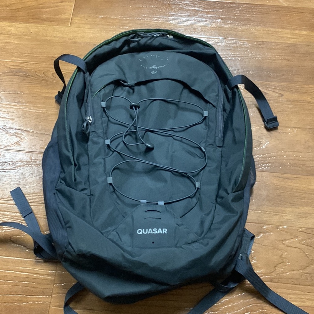 Osprey Gray Travel Backpack with Lime Green Interior